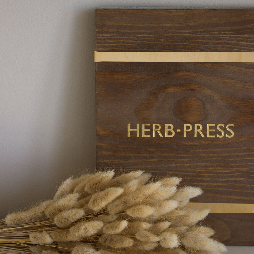 Hand made herb press. detail.