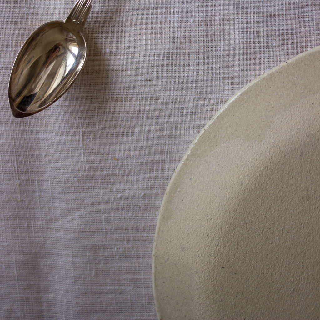 Back of the clay plate and vintage spoon. Handmade in Mallorca. 