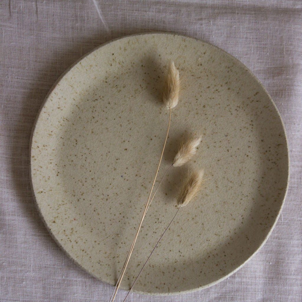 Clay plate coated with ashes from local pines. Handmade in Mallorca. 