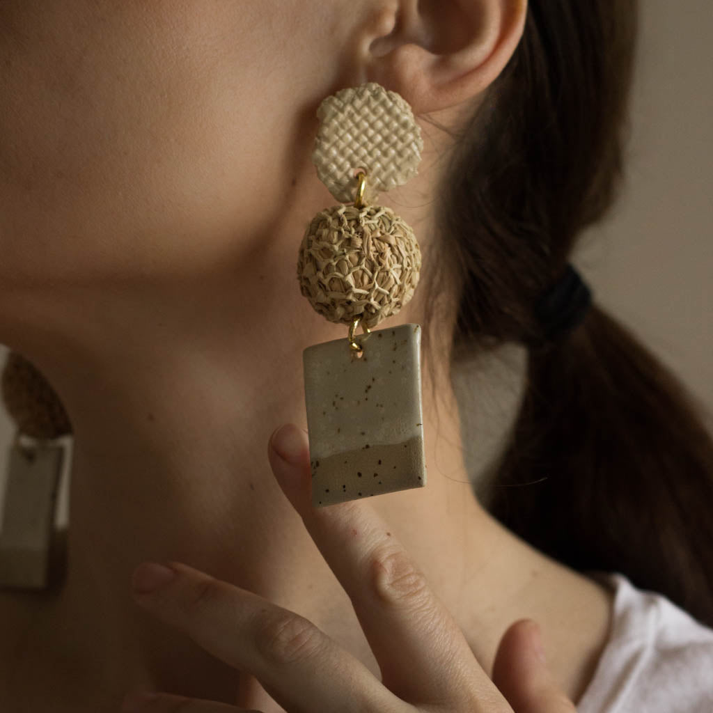 ceramic and raffia earrings from verbena and sabellar