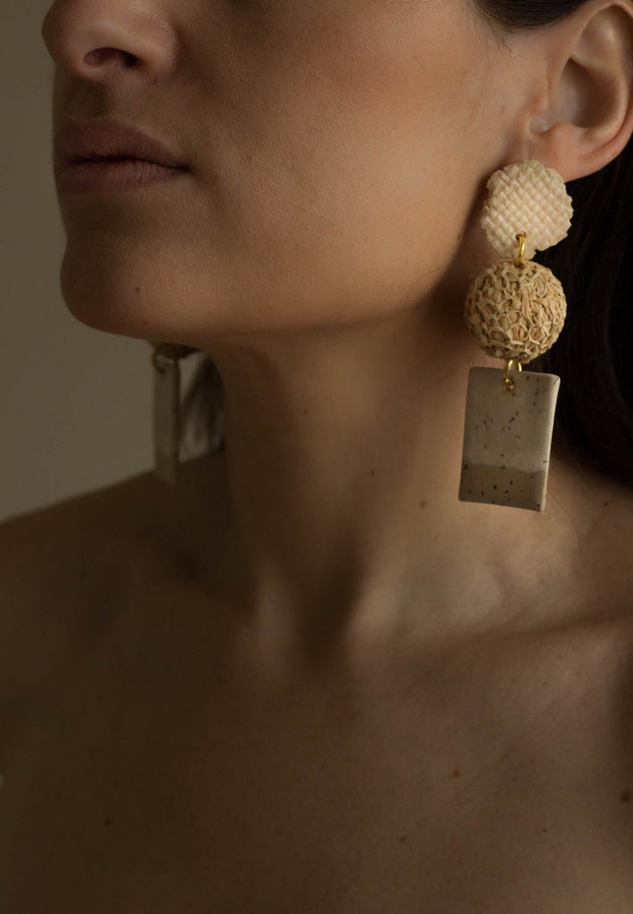 ceramic and raffia earrings from verbena and sabellar. 